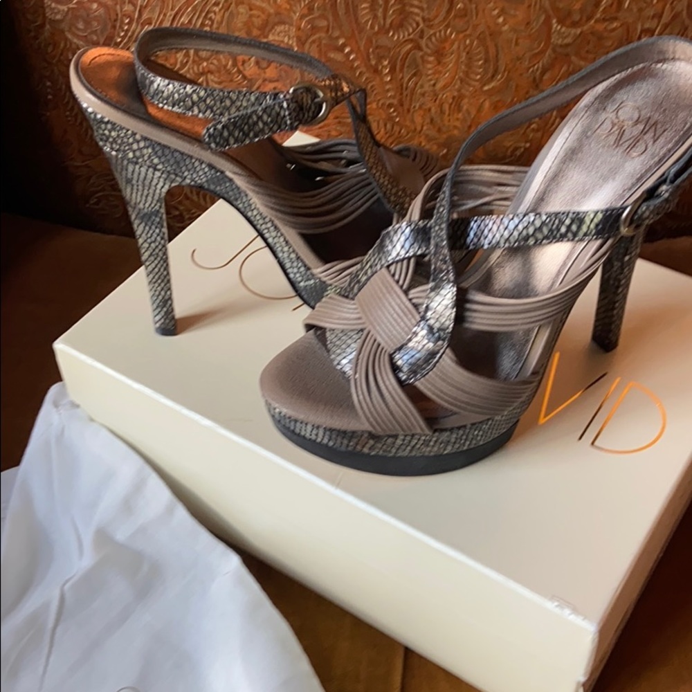 Joan and David Vitalia smoke snake heels